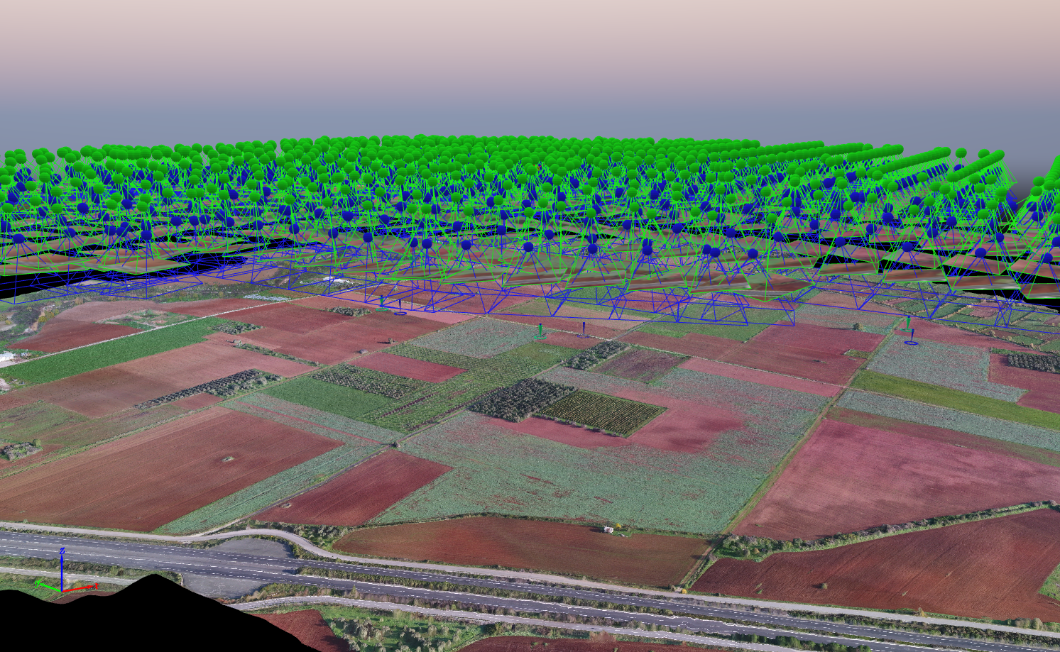 A screenshot of photogrammetric processing software, showing the drone positions of captured imagery, and the 3D textured mesh of the Voulokaliva area